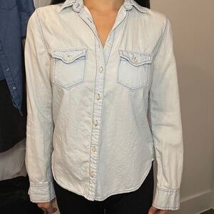 Light blue denim button up shirt